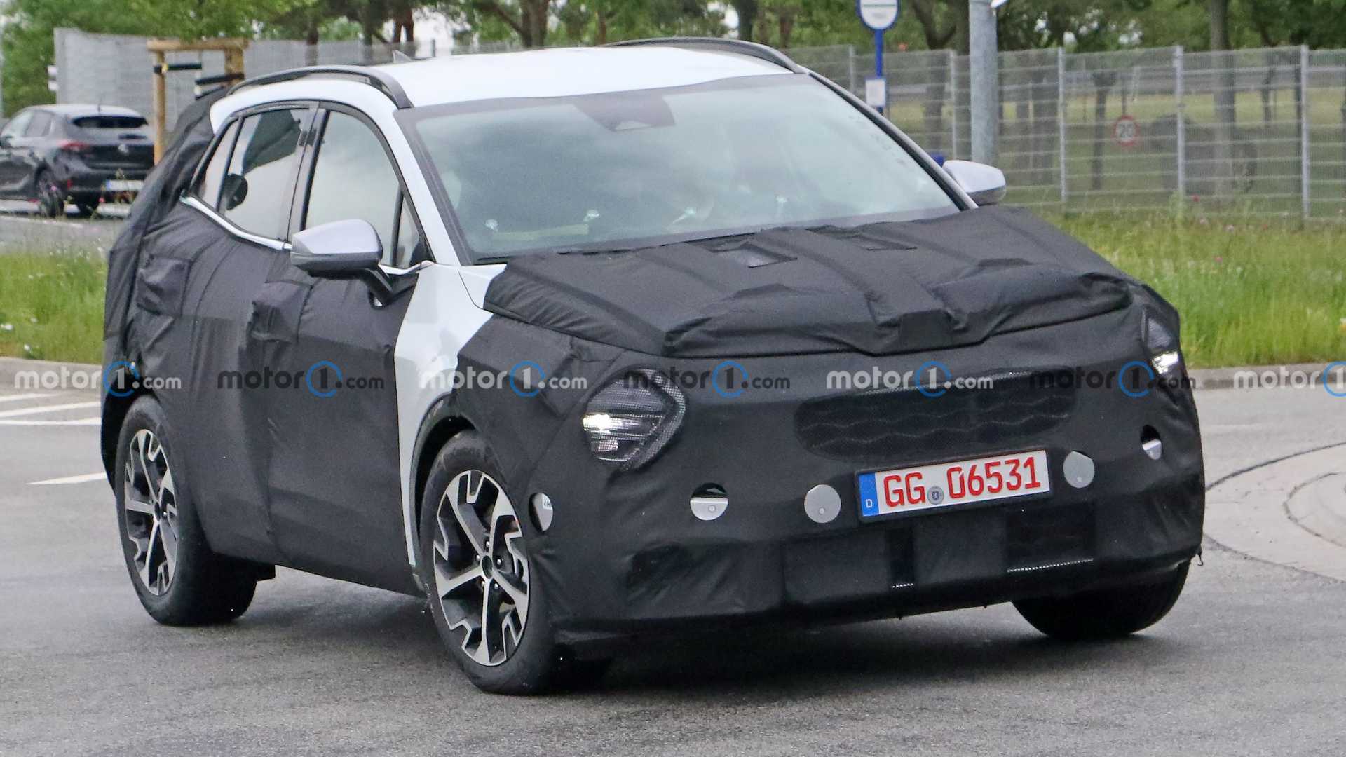 2022 Kia Sportage Caught With Funky Headlights Peeking Through Camo