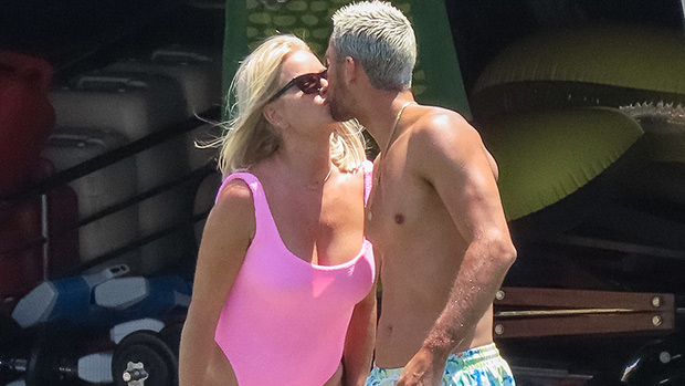 ‘RHODubai’ Star Caroline Stanbury, 46, Kisses Hubby Sergio Carrallo, 27, While Slaying in Pink Swimsuit